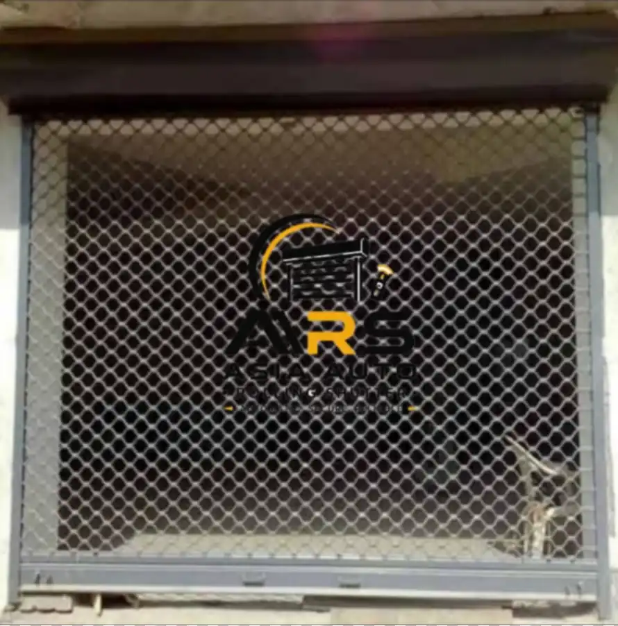 Motorized Grill Security Rolling Shutter Door Installed at Commercial Shop